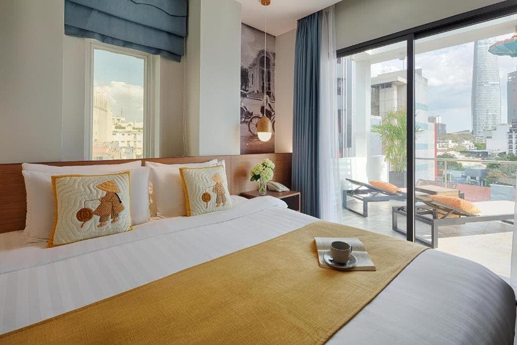 Little Suite với khu tiếp khách riêng và giường lớn